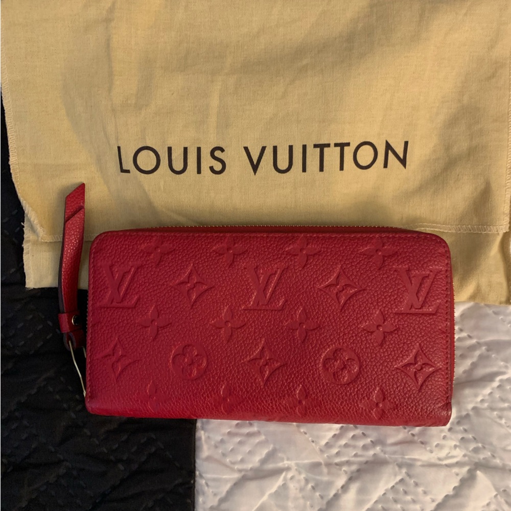Like new, bright red Louis Vuitton Empriente zippy wallet